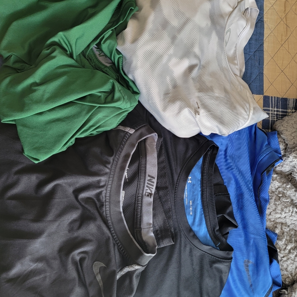 4 pre owned compression workout shirts 60$